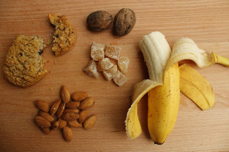 A person choosing cool soft foods from a bowl beside dental implant recovery instructions.